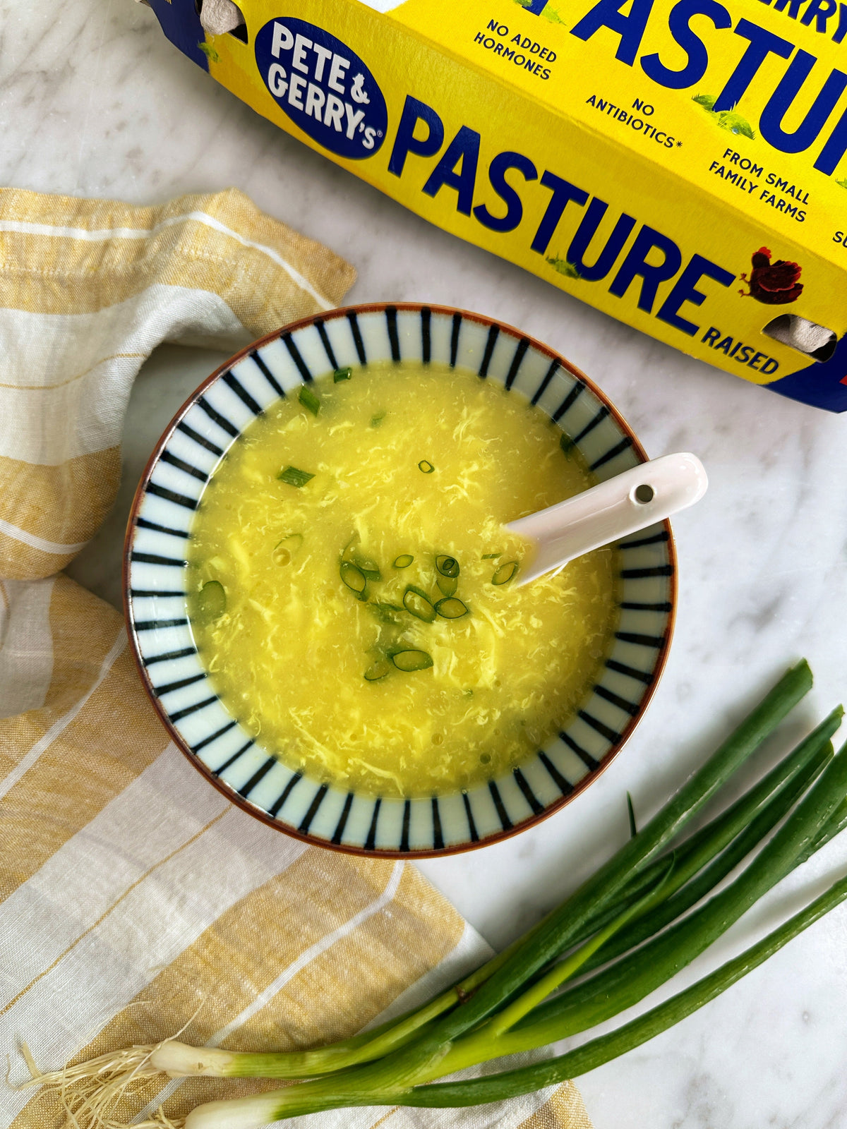 An easy takeout-style recipe for egg drop soup made with homemade chicken stock and pasture-raised egg ribbons. | peteandgerrys.com