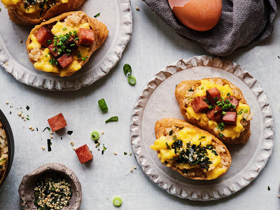 An Asian-American recipe for homemade spam and rice tofu pouches featuring soft scrambled eggs and sweet marinated tofu. | peteandgerrys.com