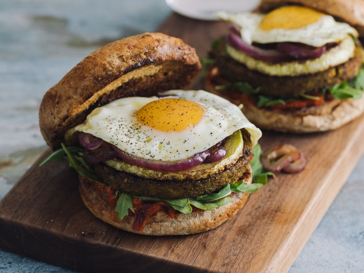 Loaded Summer Veggie Burgers with a fried Pete & Gerry's egg on top!