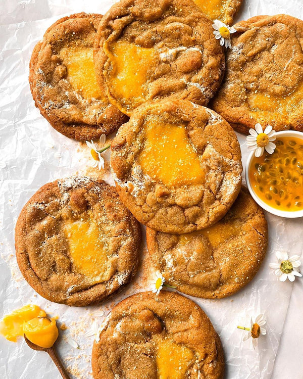 Cookies dusted with sugar and small flowers with custard filling pete and gerry's organic eggs 
