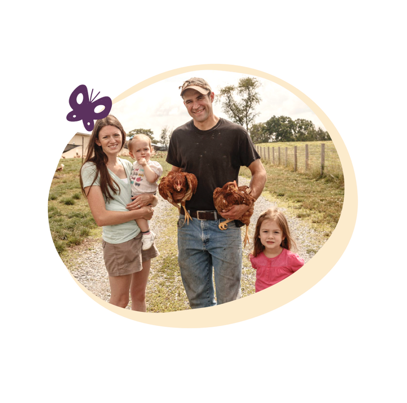 farm family standing outside holding chickens pete & gerry's organic eggs