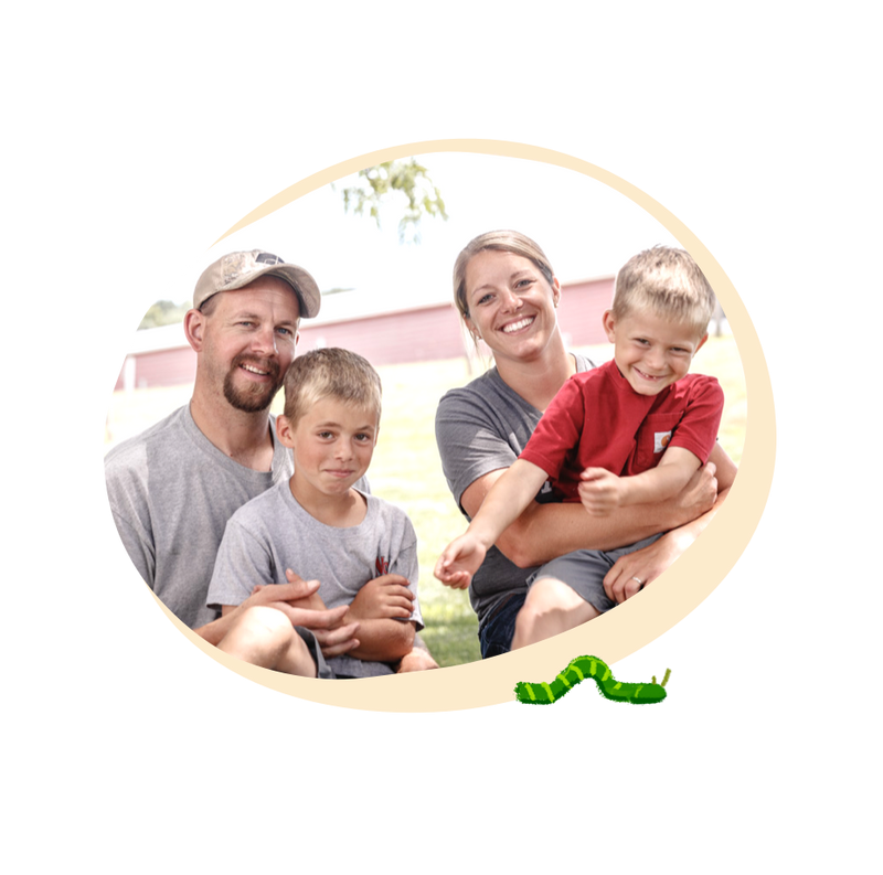 farm family smiling together outside pete & gerry's organic eggs